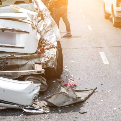 Auto accident involving two cars on a city street